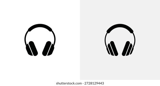 Dos auriculares negros sobre el oído estéreo de audio lado a lado