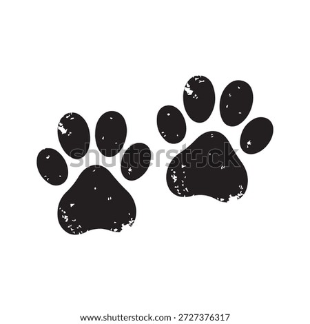 Two black paw prints with grunge texture on white background