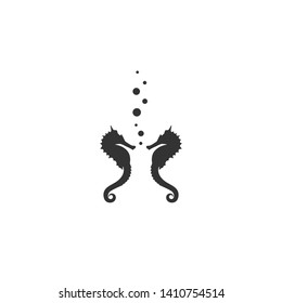 two black sea-horses or hippocampus with air bubbles on white background. Marine seahorse simple icon. Vector illustration. Ocean symbol
