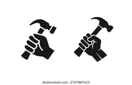 Two black silhouette icons of hands firmly gripping hammers, symbolizing labor, construction, and DIY activities.