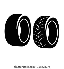 two black silhouettes of tires with white design within it
