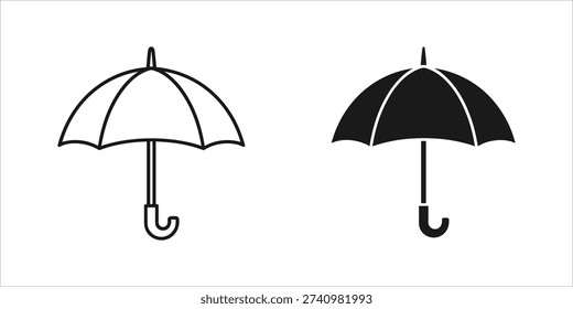 Two black and white open umbrellas line black umbrella
