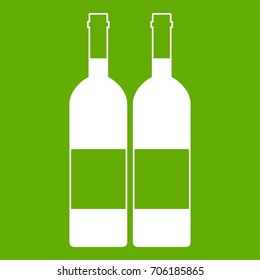 Two bottles of wine icon white isolated on green background. Vector illustration