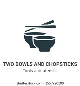 Two bowls and chopsticks vector icon on white background. Flat vector two bowls and chopsticks icon symbol sign from modern tools and utensils collection for mobile concept and web apps design.