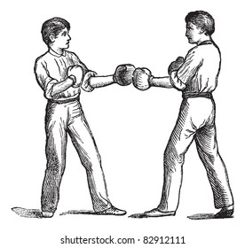 Two boxers in a fighting postion, vintage engraving. Old engraved illustration of two boxers in a fighting postion. Trousset encyclopedia (1886 - 1891).