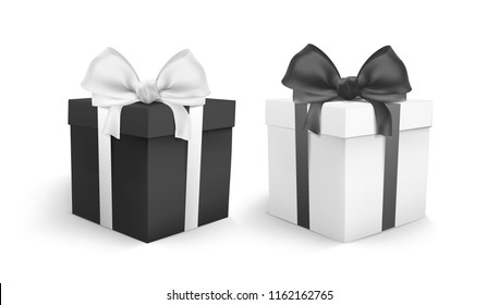 two boxes with gifts stand isolated on white background