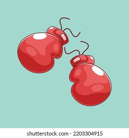 Two boxing gloves on green background
