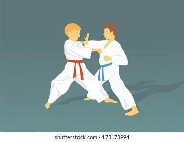 Two boys are engaged in karate against a dark background