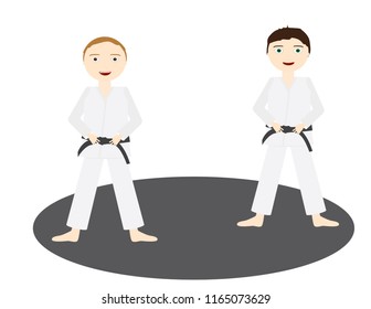 Two boys with Judo uniforms and black belt standing on a grey circle