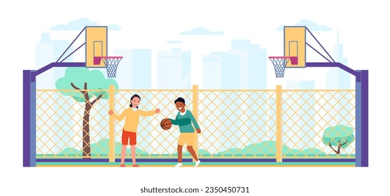 Two boys play basketball on outdoor court. City street playground. Public sports field. Friends match. Guys throw ball. Streetball baskets and grid fence. Happy players