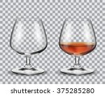 Two brandy glasses (empty and with alcohol) isolated on transparent background