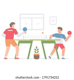 Two brothers are playing ping pong in the house