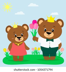 Two brown bears in the crown and clothes in the summer glade. A boy gives tulips to a girl.