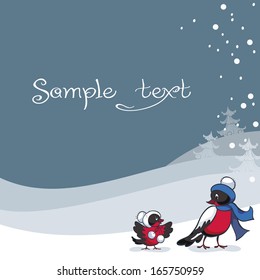 Two bullfinch in snow. winter story