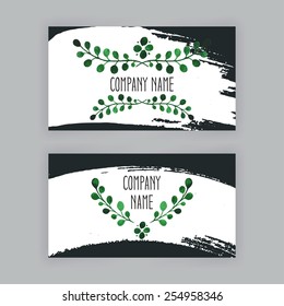 two business cards template with hand painted brush strokes and watercolor leaves