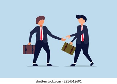 Dos hombres de negocios se dan la mano en la reunión de la asociación.