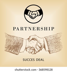 Two business partners agreed a deal and doing handshaking. 
