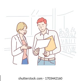 Two business people discussing work.Man and woman working at an office talking about files or project. Hand drawn style vector design illustrations.