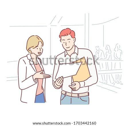 Two business people discussing work.Man and woman working at an office talking about files or project. Hand drawn style vector design illustrations.