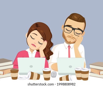 Two business people resting head on hand tired working at office with lots of coffee drinks lying on desk
