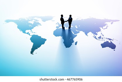 Two business persons shaking hands on flat world map