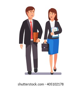 Two Business Professionals Man And Woman Walking Together Discussing A Project. Flat Style Vector Illustration.