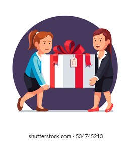 Two business woman carrying big white holiday gift box decorated with red ribbon bow over their heads. Flat style isolated vector illustration.