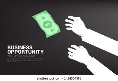 Two Businessman hand try to grabbing money falling from sky. Concept for business opportunity and competition.
