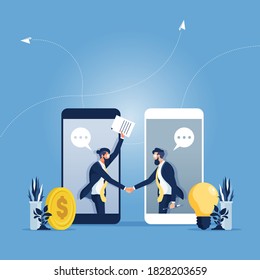 Two businessman settle contract with signing up contract and handshake