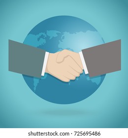 Two businessman shaking hands on green background and world icon.Business handshake for partner deal concept.