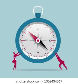 Two businessmen hold up the compass. Isolated on blue background.