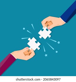 Two businessmen put two matching puzzle pieces together. in the concept of teamwork and cooperation.eps
