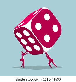 Two businessmen raised huge dice. Isolated on blue background.