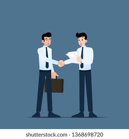 Two Businessmen standing and shake hands each other for cooperation and make a deal.