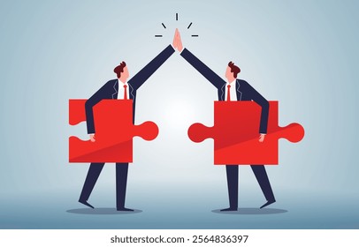 two businessmen taking parts of a puzzle to connect and High five