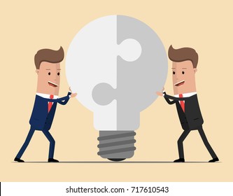 Two businessmen unite lamp of the puzzle. Joining forces, the birth of a new idea