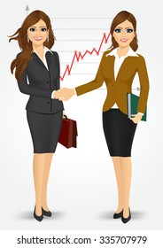 two businesswomen with briefcase and paper folder shaking hands happy standing negotiating on background of line chart