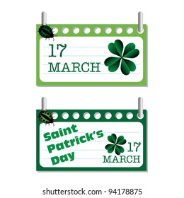 Two calendar sheets for Saint Patrick's Day decorated with four leaf clovers and a green ladybird