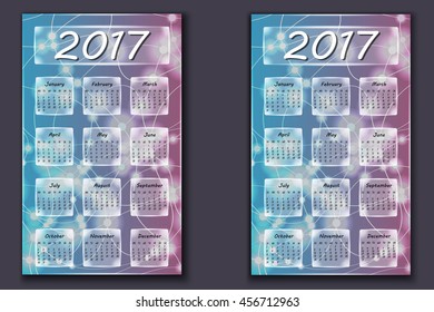 two calendars with abstract bokeh background in 2017 year, beginning with Monday and Sunday