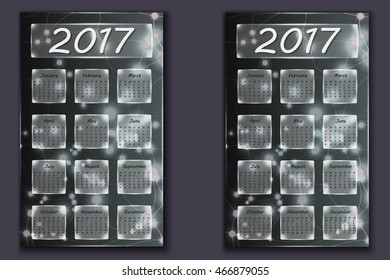 two calendars with abstract bokeh background in 2017 year, beginning with Monday and Sunday