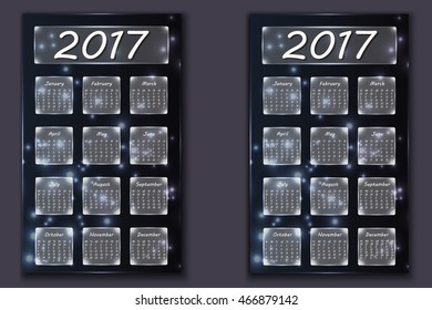 two calendars with abstract bokeh background in 2017 year, beginning with Monday and Sunday
