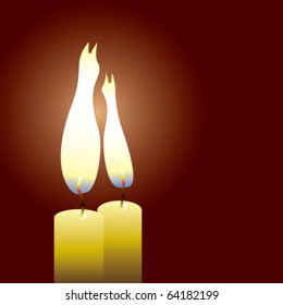 Two candles with flames in form of cat's silhouettes