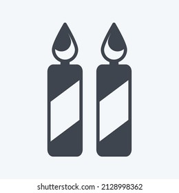 Two Candles Icon in trendy glyph style isolated on soft blue background