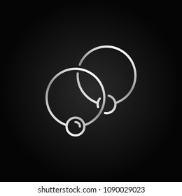 Two captive silver rings icon - vector ball closure ring sign or logo element in linear style on dark background