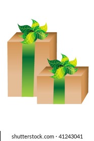 Two cardboard giftboxes with green ribbon and leaves for bows