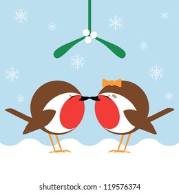 two cartoon robin redbreasts kissing under the mistletoe