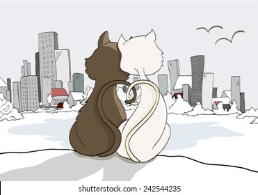 Two cats looking at a city