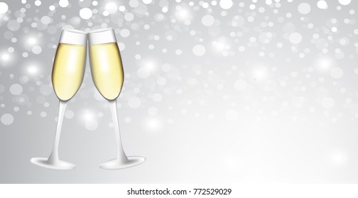Two champagne glasses on blurred background