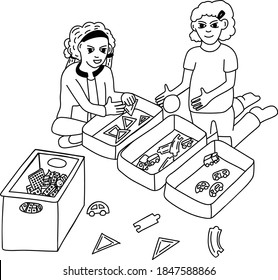 Two Children Cleaning Up Toys