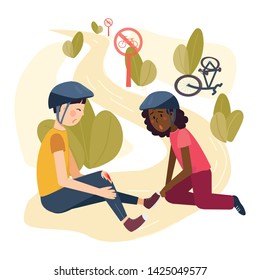Two children friends after a bicycle crush accident. A girl and a boy with a wound on his knee are sitting on the background of the park and signs "bike rides is prohibited". Road safety concept.